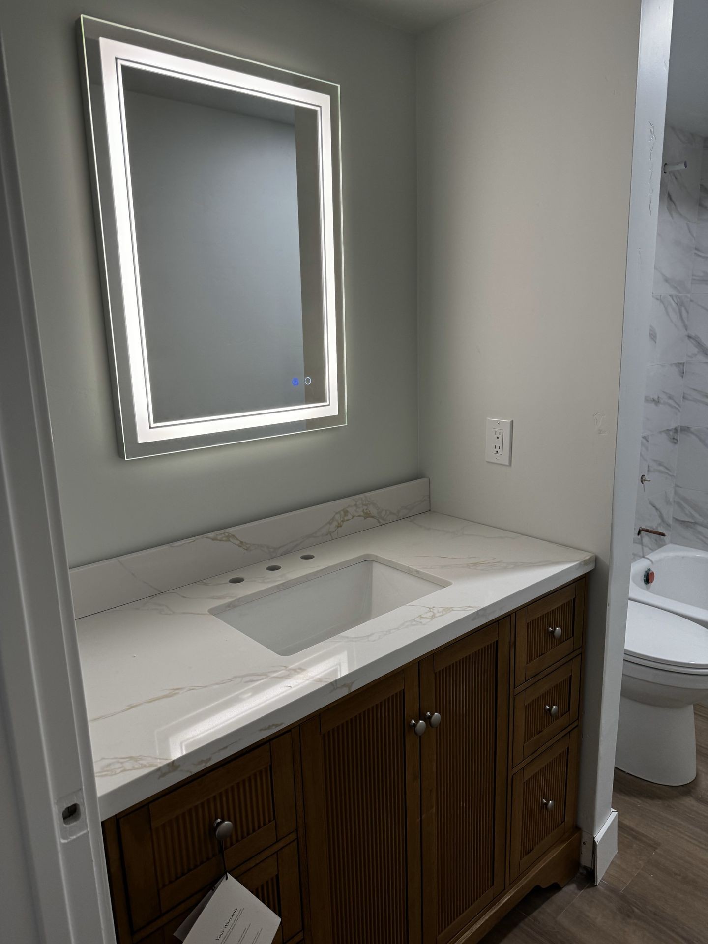 Oversized Window + Full Bath